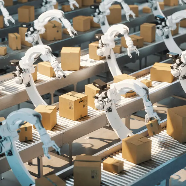 Robots with boxes in a manufacturing plant Robots with boxes in a manufacturing plant