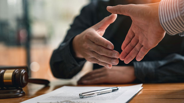 Two people shaking hands 