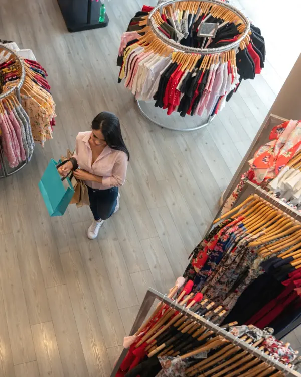 Woman in a retail clothing store Woman in a retail clothing store