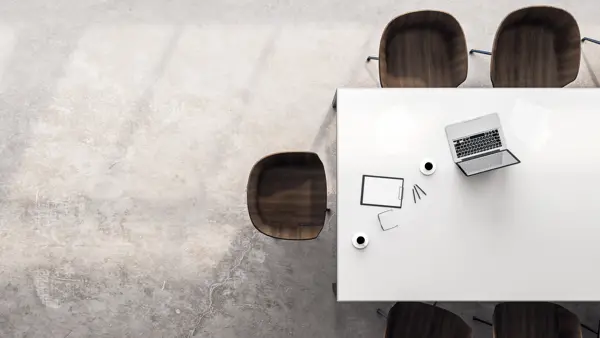 White table with chairs and a laptop White table with chairs and a laptop
