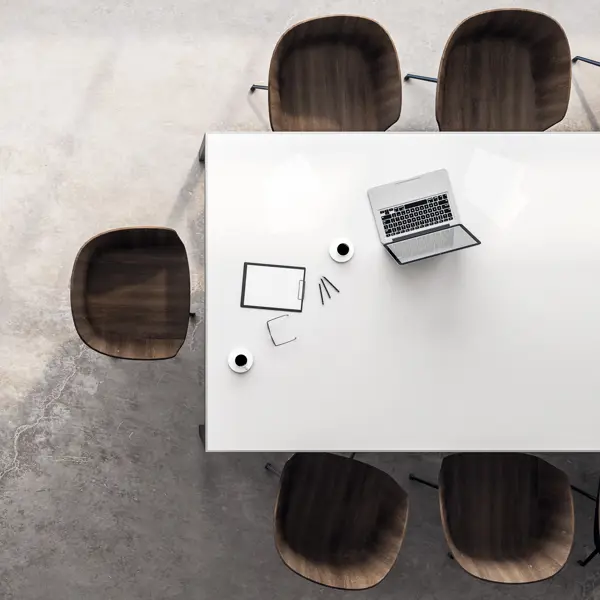White table with chairs and a laptop White table with chairs and a laptop