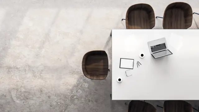 White table with chairs and a laptop White table with chairs and a laptop